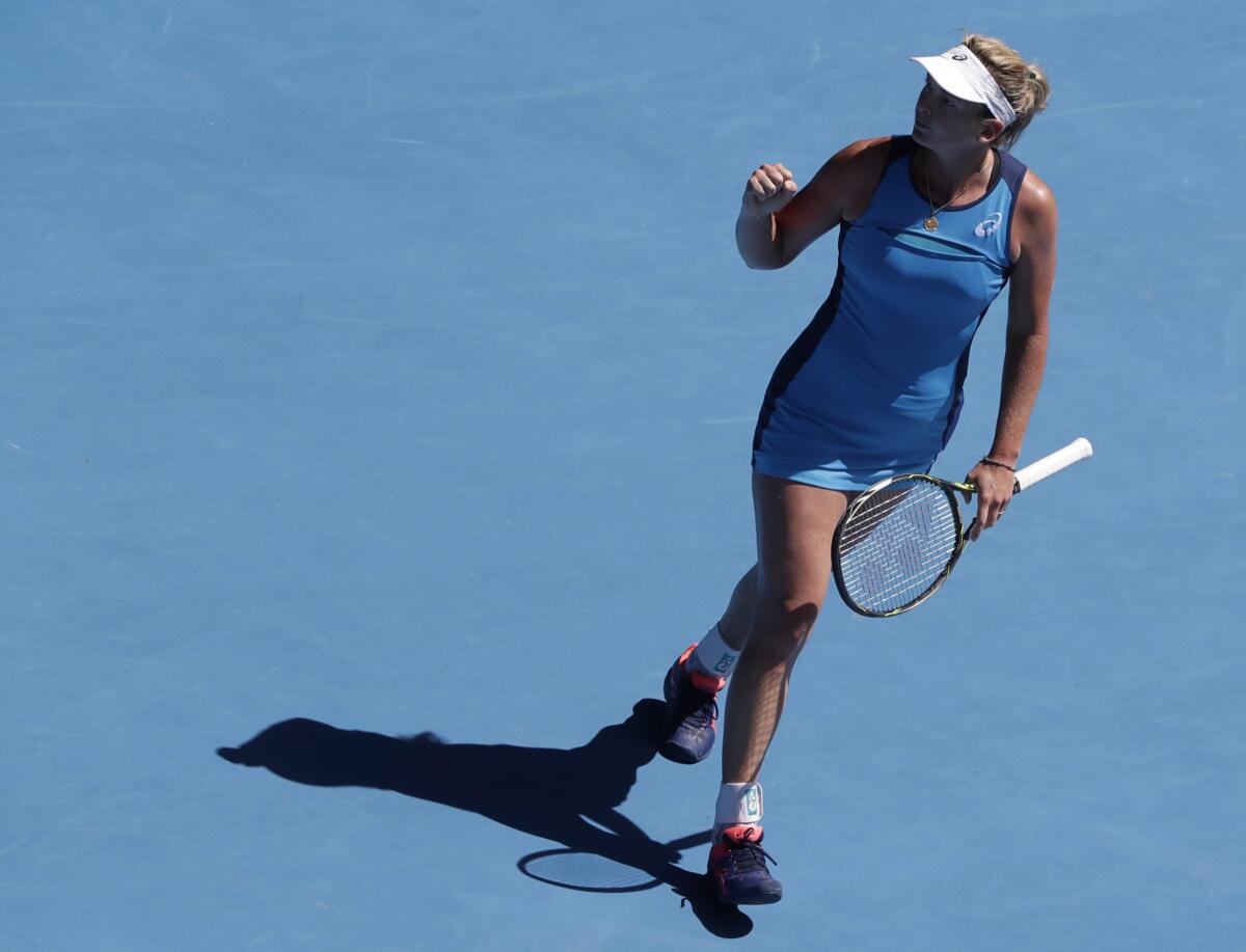 CoCo Vandeweghe celebrates after winning against Garbine Muguruza during a women's singles quarterfinal match at the Australian Open on Jan. 24.