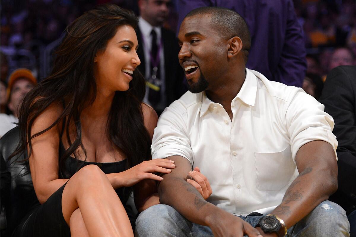 Kim Kardashian has finally gained weight she's happy about, in the form of a 15-karat diamond on her left ring finger. Long-time beau Kanye West proposed to the reality TV star on her 33rd birthday, booking San Francisco's AT&T Park and a 50-piece orchestra for an unforgettable surprise.