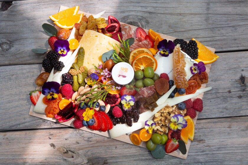 A cheese, fruit and cured meat board from Lady & Larder. Lady & Larder has opened a takeout provisions shop called Lady Bodega to keep the business afloat during the coronavirus outbreak. They are also a distribution center for produce boxes. 