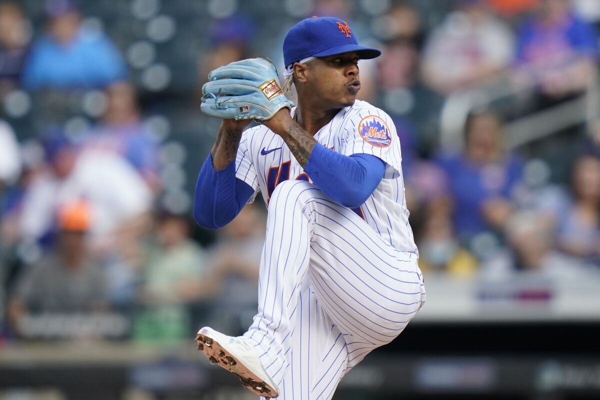 New York Mets' Marcus Stroman (0) pitches against the Miami Marlins