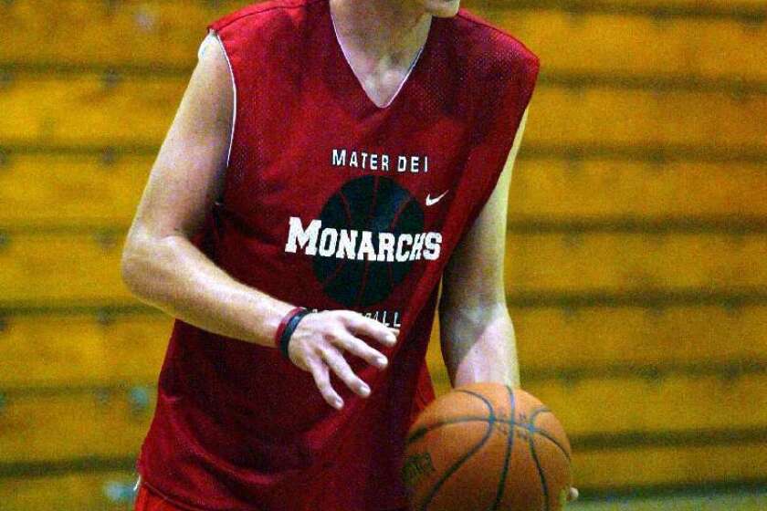 Taylor King, in 2003 when he played for Mater Dei, is back playing basketball again.