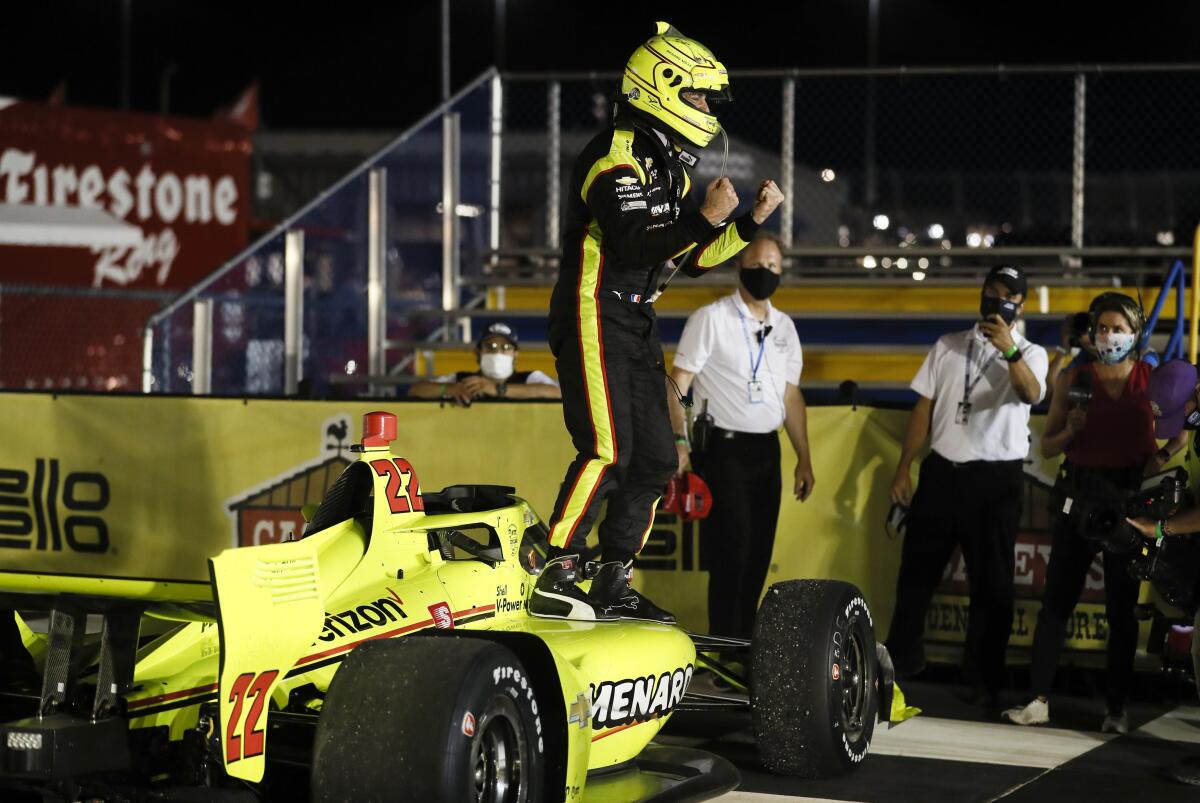 Simon Pagenaud celebrates after winning an IndyCar race July 17, 2020, at Iowa Speedway.