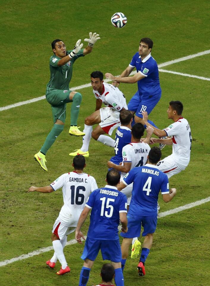 Costa Rica's goalkeeper Keilor Navas makes a save during the 2014 World Cup round of 16 game between Costa Rica and Greece at the Pernambuco arena
