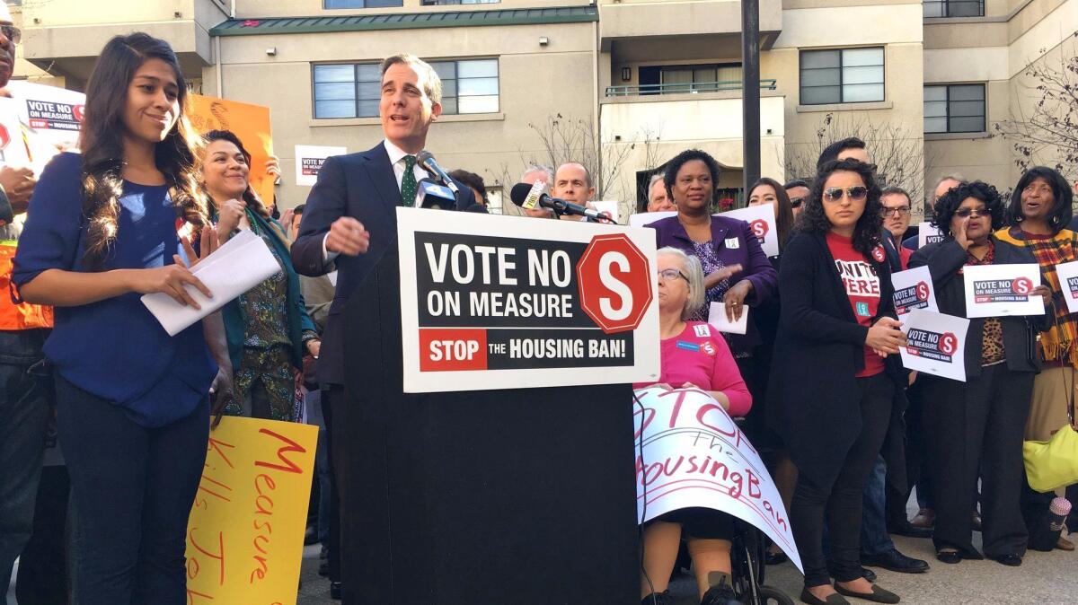 Los Angeles Mayor Eric Garcetti appears in late January with leaders of labor unions, business groups and nonprofit organizations that oppose Measure S.