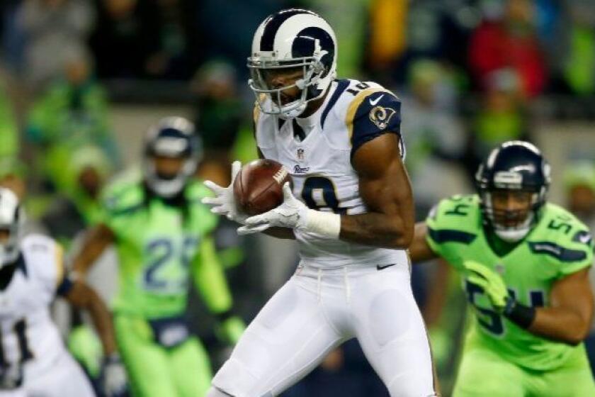 Rams receiver Kenny Britt catches a pass during a game against the Seahawks on Dec. 15.