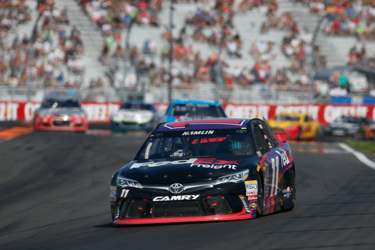 Denny Hamlin, driver of the No. 11 FedEx Freight Toyota, races during the NASCAR Sprint Cup Series Cheez-It 355 at Watkins Glen International on Aug. 7.