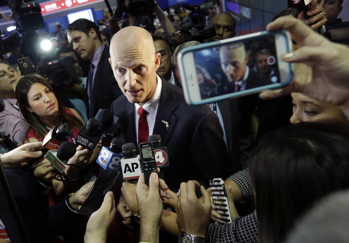 Florida Gov. Rick Scott withheld his endorsement until after the Florida primary. (Alan Diaz / Associated Press)