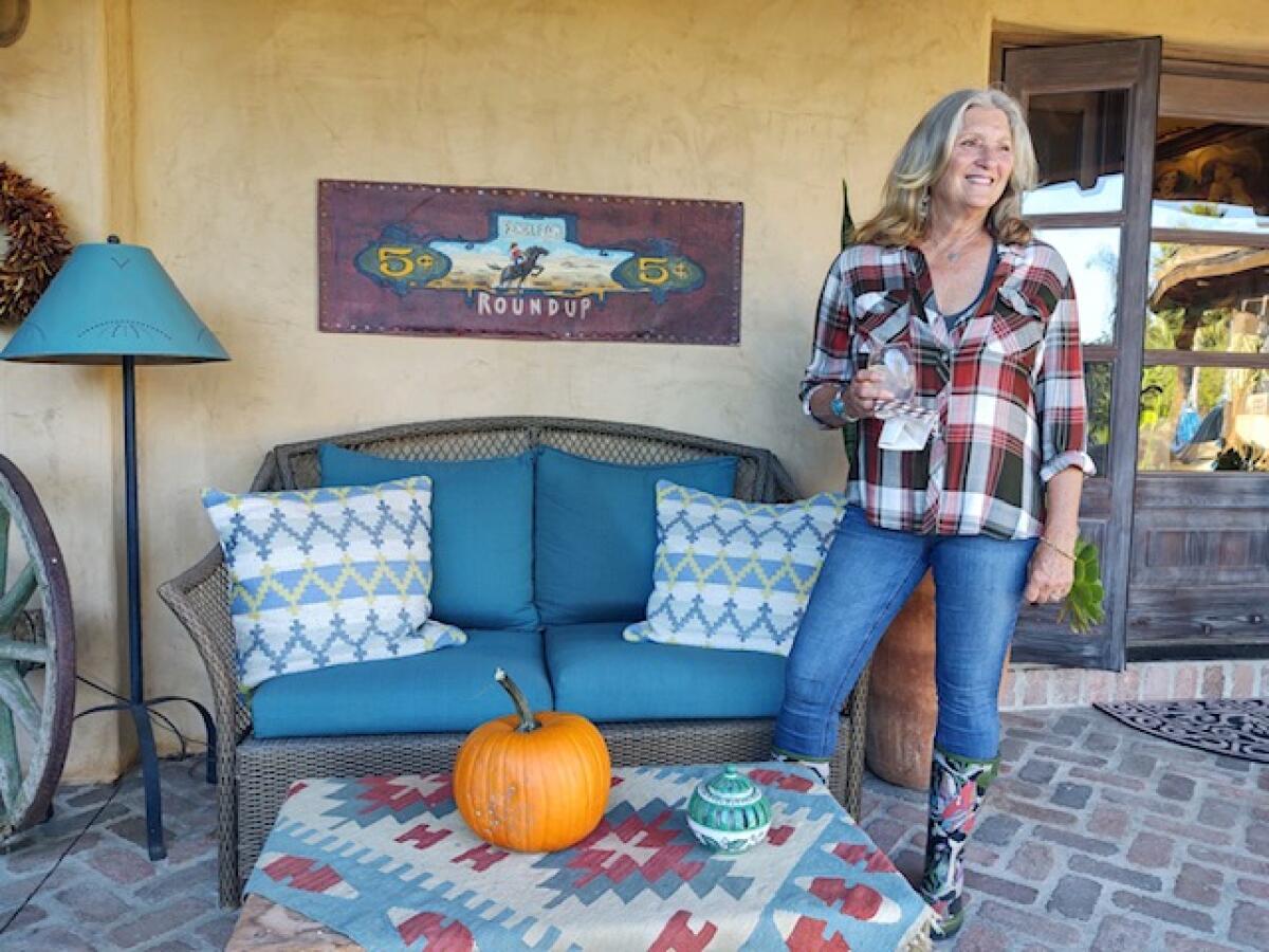 Helen DiZio with vintage Corner Store items.
