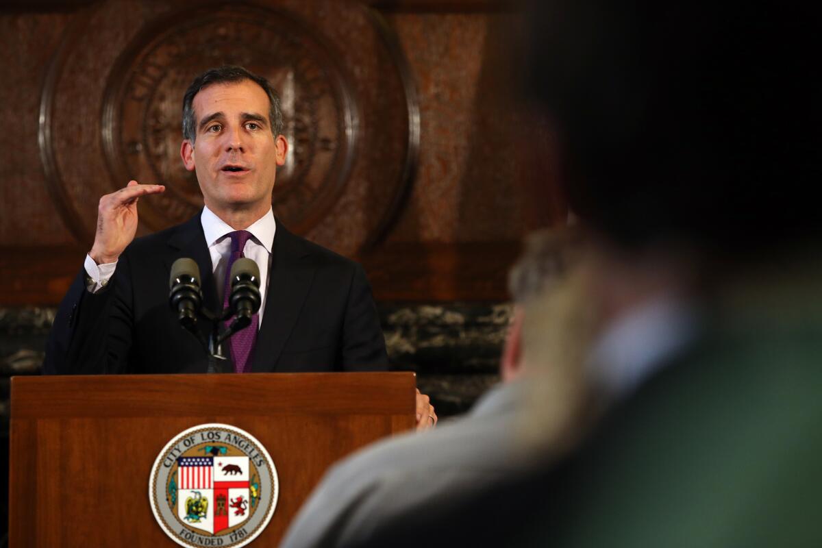 Los Angeles Mayor Eric Garcetti speaks Tuesday at a news conference at City Hall regarding the L.A. Police Commission's ruling on the Ezell Ford case.