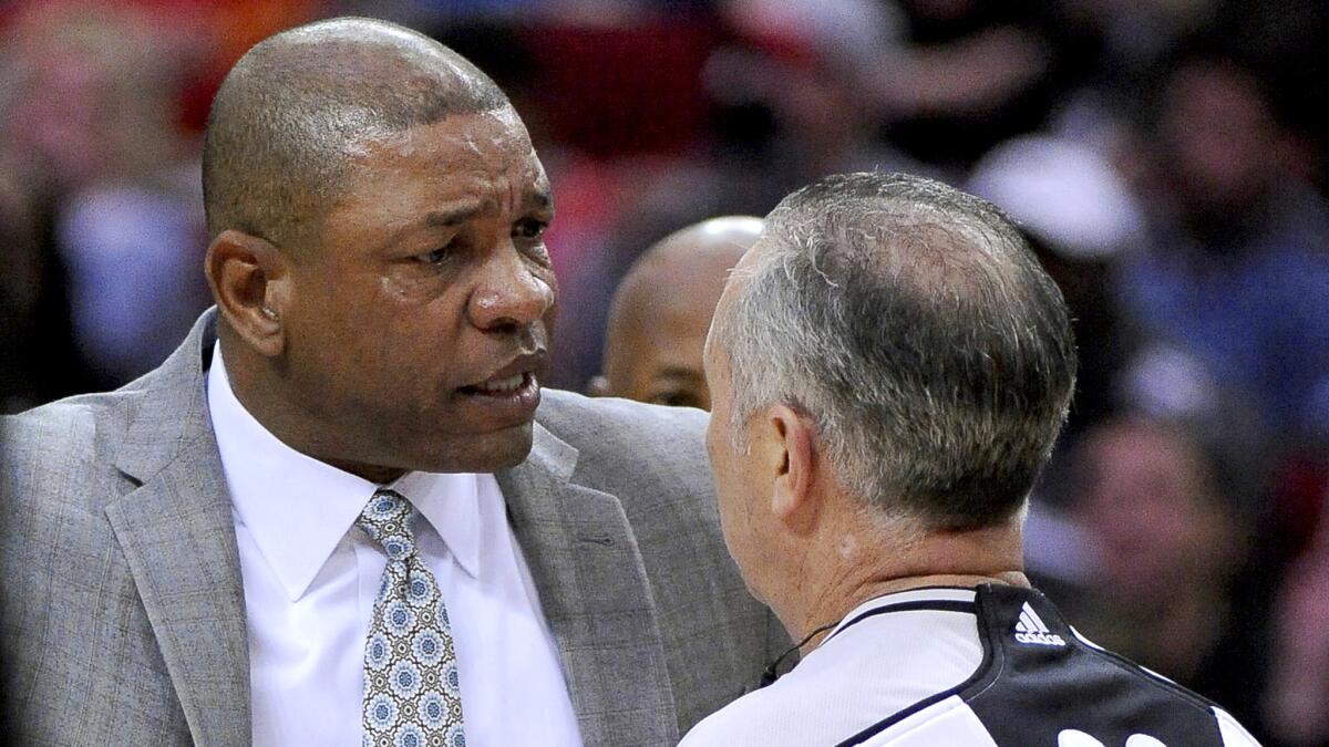 Clippers Coach Doc Rivers argues with referee Jason Phillips before being ejected Friday night in Houston.
