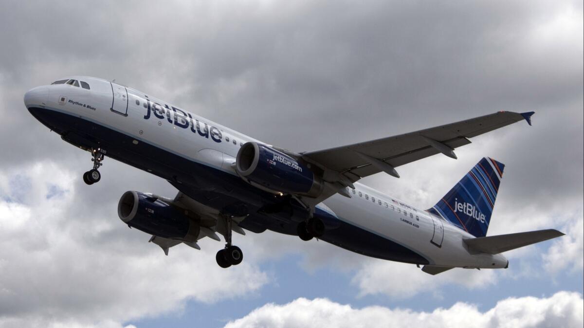 JetBlue says it will reduce its daily flights at Long Beach Airport from 35 to 23 in September, giving Huntington Beach officials some hope of relief from airplane noise that has drawn complaints from residents and Rep. Dana Rohrabacher.