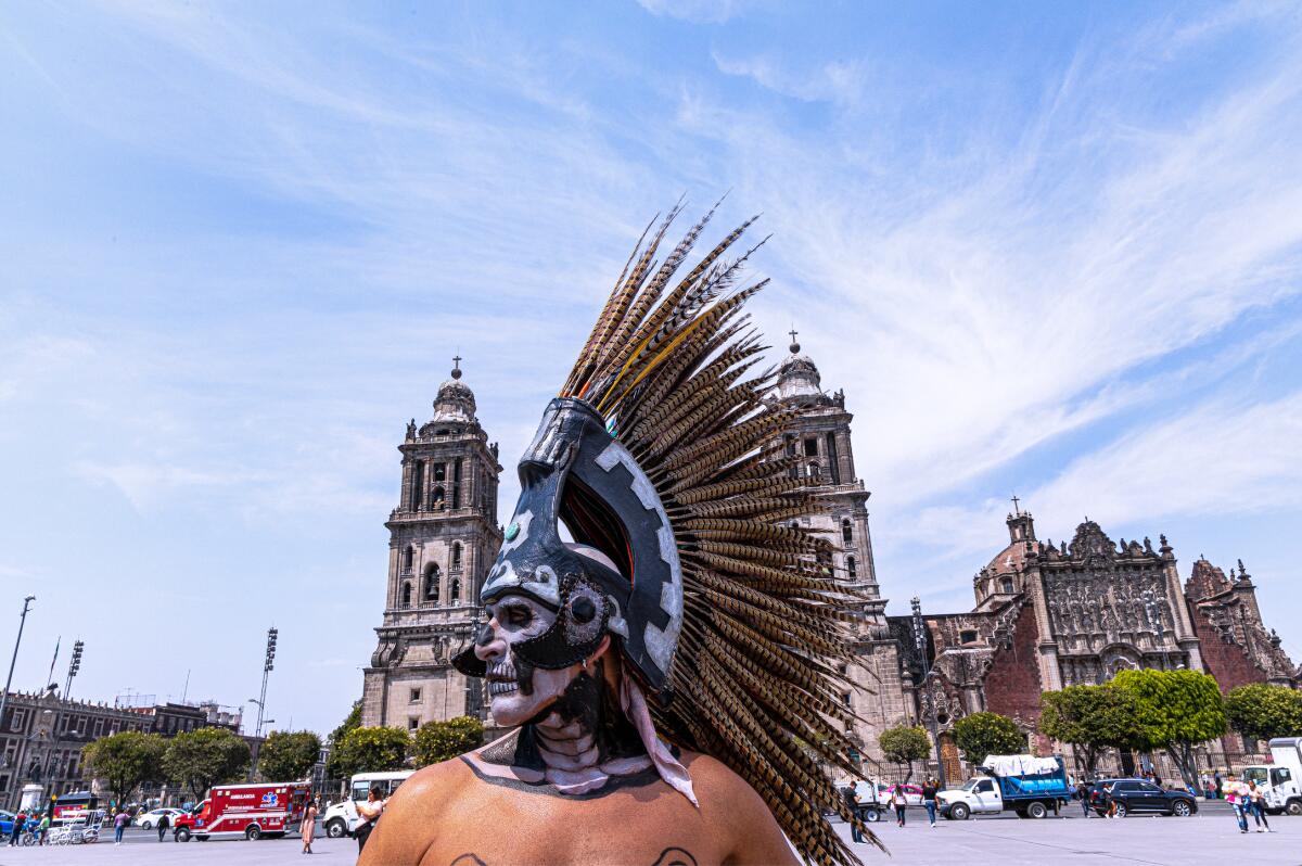 An Aztec dancer in costume.