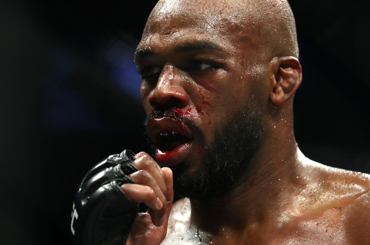 HOUSTON, TEXAS - FEBRUARY 08: Jon Jones in his fight against Dominick Reyes in their UFC Light Heavyweight Championship bout during UFC 247 at Toyota Center on February 08, 2020 in Houston, Texas. (Photo by Ronald Martinez/Getty Images)