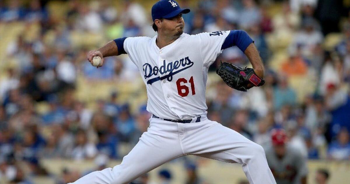 Dodgers pitcher Josh Beckett lets his wife of two years do the