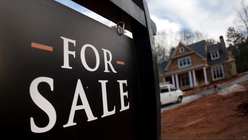 A home under construction and for sale is shown in Roswell, Ga.