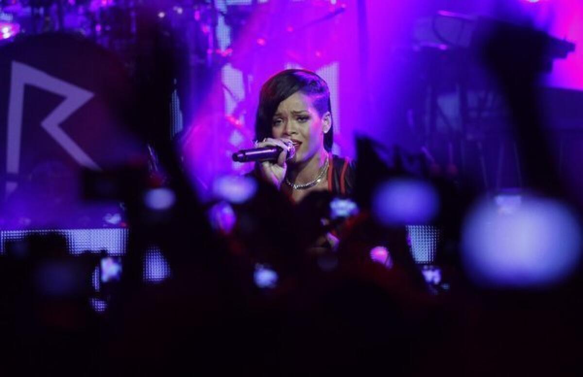 Barbadian singer Rihanna performs during the first stop of her 777 worldwide tour at the Plaza Condesa in Mexico City, Wednesday, Nov. 14, 2012.