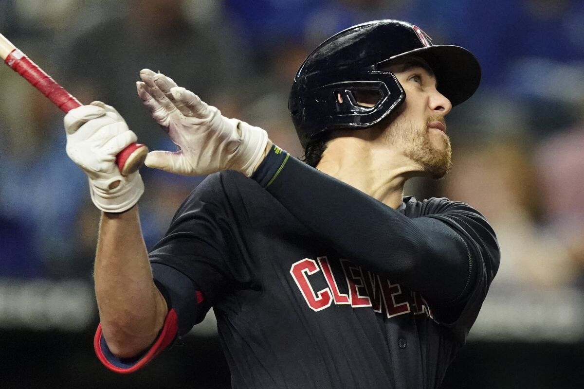 FILE - Cleveland Indians' Bradley Zimmer watches an RBI sacrifice fly during the third inning of the team's baseball game against the Kansas City Royals on Sept. 30, 2021, in Kansas City, Mo. The Guardians have traded Zimmer to the Toronto Blue Jays for reliever Anthony Castro. (AP Photo/Charlie Riedel, File)