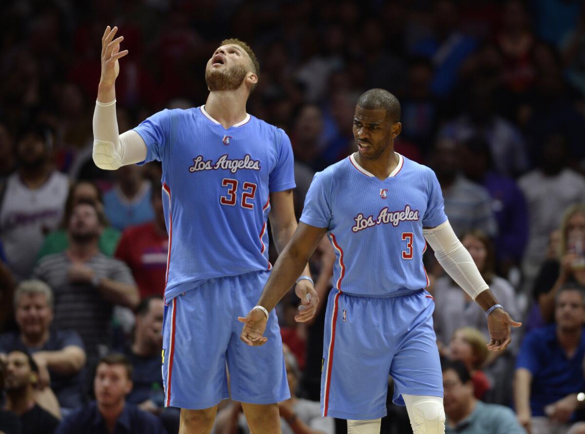 Clippers forward Blake Griffin and point guard Chris Paul react after Griffin was called for an offensive foul in the fourth quarter.