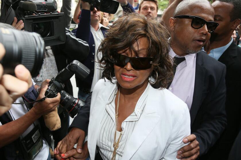 Rebbie Jackson, left, and Randy Jackson attend the first day of the family's suit against AEG.
