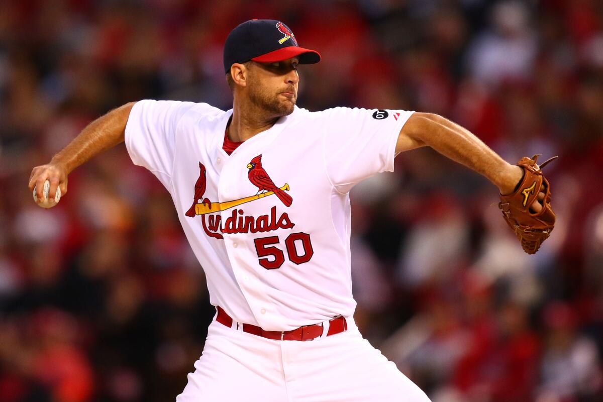 Cardinals ace Adam Wainwright delivers a pitch against the Reds during a game April 19 in St. Louis.