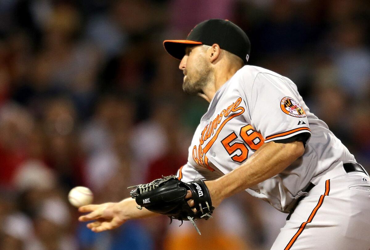 Baltimore Orioles reliever Darren O'Day throws a pitch during the eighth inning of a game against the Boston Red Sox on June 23.