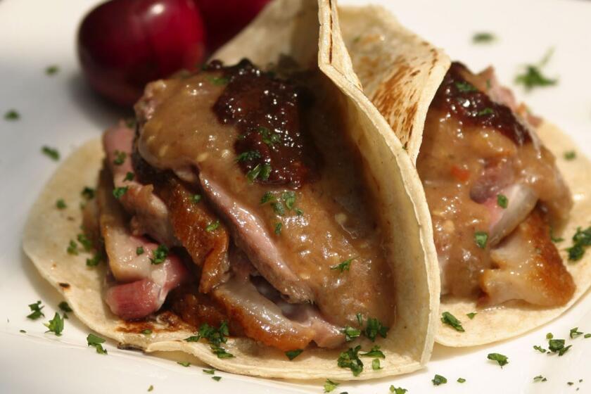 Duck tacos with chile-cherry compote.