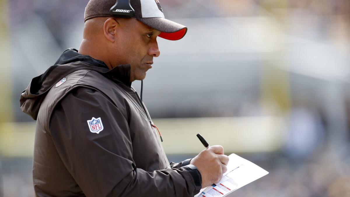 Former Cleveland Browns head coach Hue Jackson works the sideline as his team plays against the Pittsburgh Steelers.