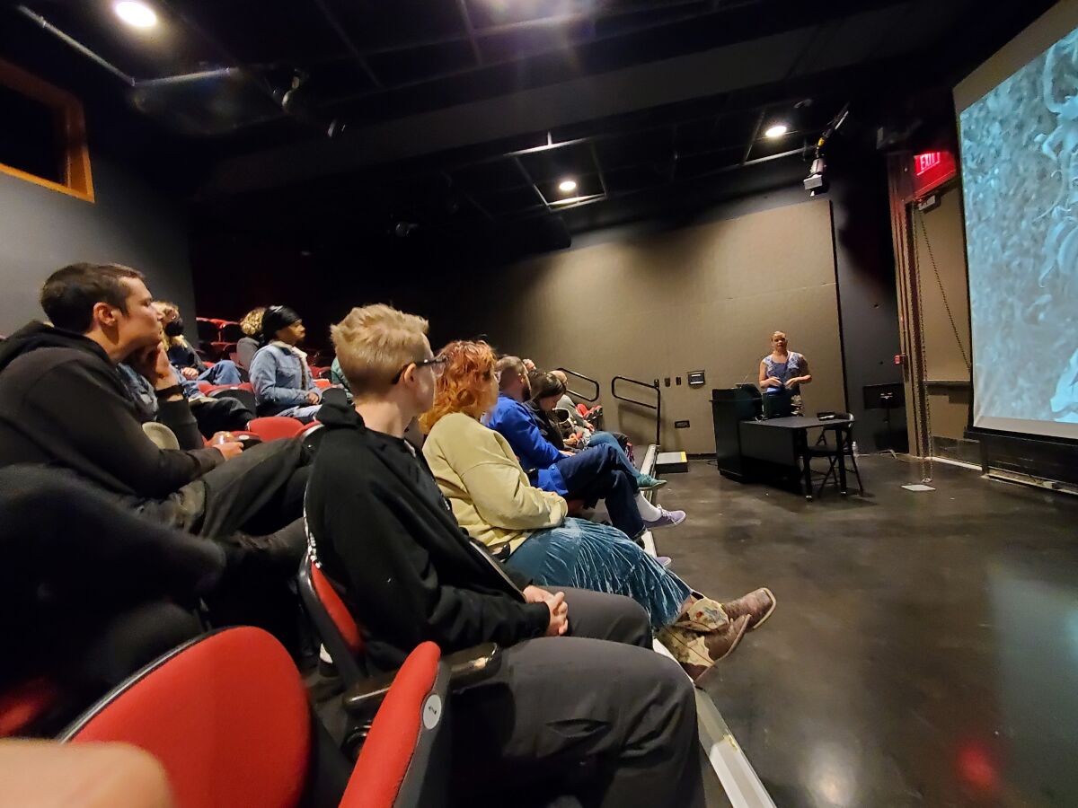 Filmmaker Tourmaline (at the podium) discusses her films and creative processes at UC San Diego on April 6.