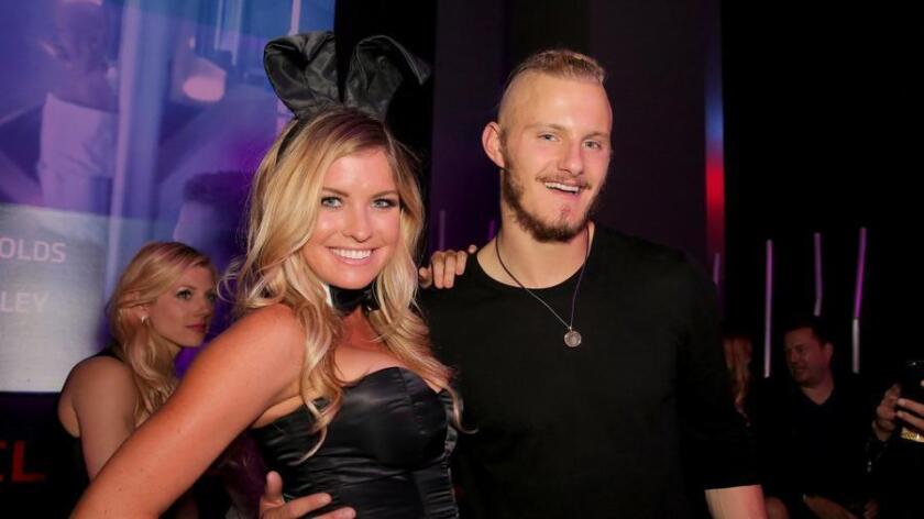 Miss February 2007 Carly Lauren (L) and actor Alexander Ludwig attend Playboy and Gramercy Pictures' Self/less party during Comic-Con weekend at Parq Restaurant & Nightclub on July 10, 2015 in San Diego, California. - Getty Images