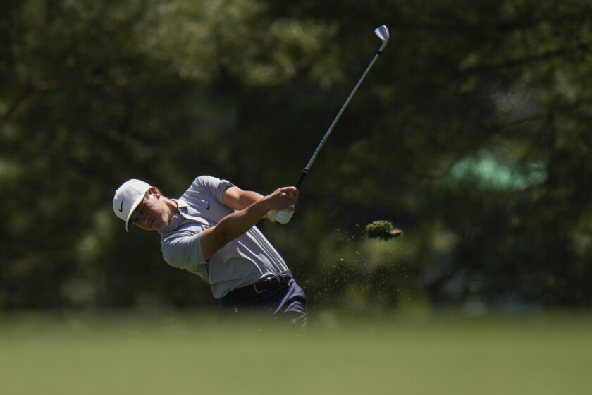 Cameron Champ hits on the first fairway during the final round at the Masters golf tournament on Sunday, April 10, 2022, in Augusta, Ga. (AP Photo/Jae C. Hong)