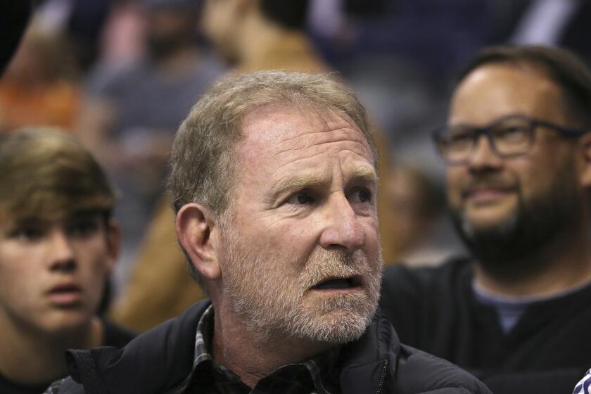 Phoenix Suns owner Robert Sarver watches his team play against the Memphis Grizzlies during the second half of an NBA basketball game Wednesday, Dec. 11, 2019 in Phoenix. The Grizzlies defeated the Suns 115-108. (AP Photo/Ross D. Franklin)