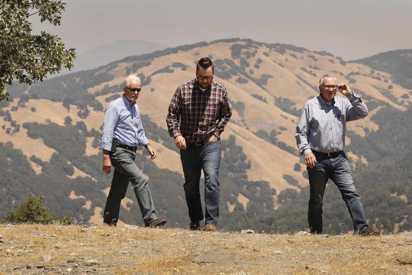 TEJON RANCH, CA â AUGUST 06, 2018: Barry Zoeller, vice president of corporate communications, Nathan Keith, director of planning and Greg Medeiros, vice president of community development for Tejon Ranch Company, left to right, tour a small portion of the 90% of protected area of Tejon Ranch set aside for permanent preservation in exchange for environmental groupsâ promise not to oppose development. At stake is the 12,000 acre proposed master planned community named Centennial on the flat grassland of the ranch off Highway 138, if approved, would bring in up to 19,333 residences, a mix of single-family, multi-family and apartment units, with a business park and open space around their periphery. (Al Seib / Los Angeles Times)