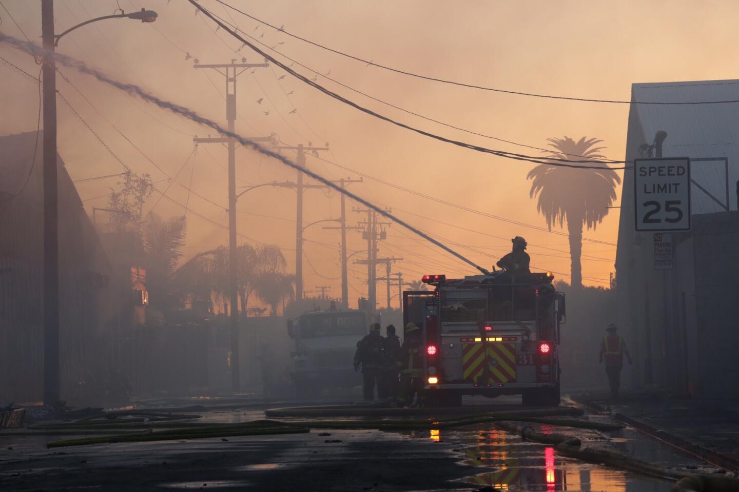An investigation is underway into the cause of a massive blaze that destroyed businesses in an industrial part of South L.A. early Wednesday.
