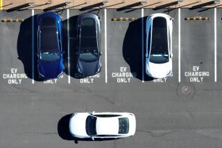 CORTE MADERA, CALIFORNIA - FEBRUARY 15: In an aerial view, Tesla cars recharge at a Tesla charger station on February 15, 2023 in Corte Madera, California. Electric car company Tesla is partnering with the U.S. federal government to expand electric vehicle charging infrastructure in the United States. Tesla announced plans to open an estimated 7,500 of its Tesla Superchargers in the country to all brands of electric vehicles by the end of 2024. (Photo by Justin Sullivan/Getty Images)