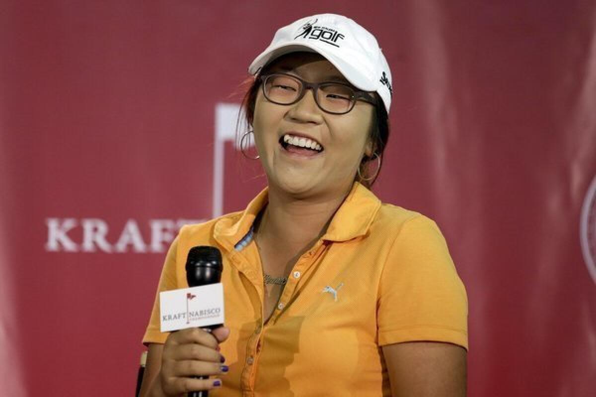 Lydia Ko chuckles during a news conference on Wednesday at the LPGA Kraft Nabisco Championship.