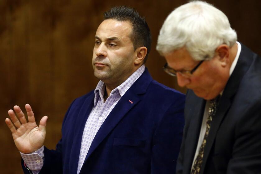 Joe Giudice, from "The Real Housewives of New Jersey," appeared before a New Jersey Superior Court judge on Oct. 15 with attorney Miles Feinstein.