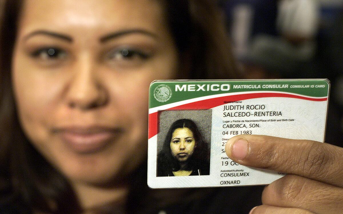 Mel Melcon   Judith Rocio SalcedoRenteria, 19, from Santa Maria, holds her newly issued Matricula Consular ID.