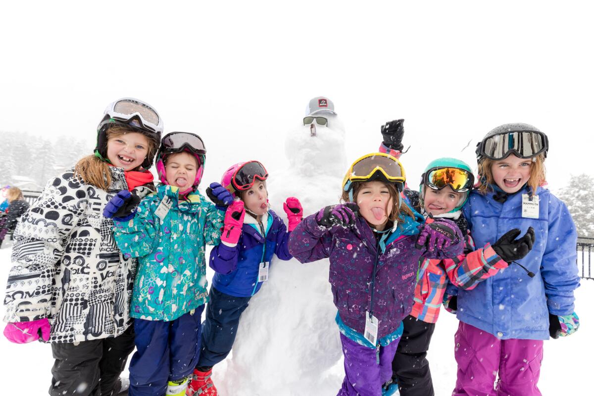 Children with Snowman at Big Bear Mountain Resort.