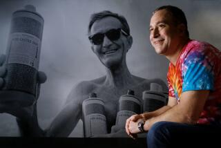 VISTA, CA: JANUARY 19, 2017 | Michael Bronner, president of Dr. Bronner's, makers of hemp formulated soaps, organic bars, lip balm and body care products, with a photo of his grandfather, Emanuel Bronner. The company is releasing audio recordings made by his grandfather on The Moral ABC's, which are the foundation of the company. | Photo by Howard Lipin/San Diego Union-Tribune/Mandatory Credit: HOWARD LIPIN SAN DIEGO UNION-TRIBUNE/ZUMA PRESS