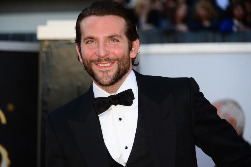 Lead actor nominee Bradley Cooper ("Silver Linings Playbook") arrives on the red carpet for the Oscars.