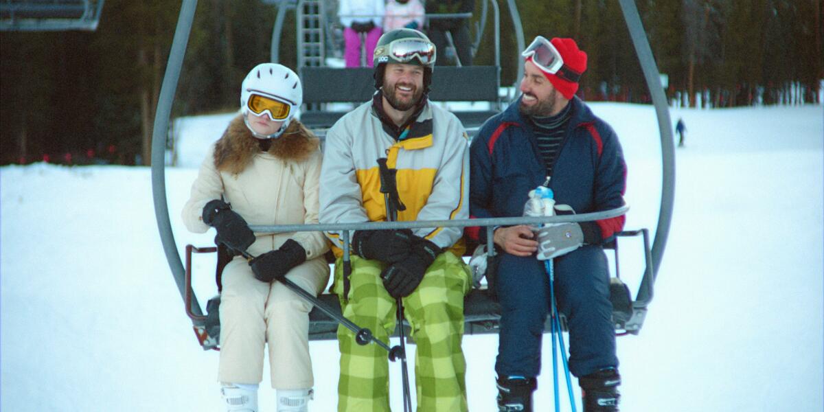 Three people on a ski lift in the movie "The Climb."