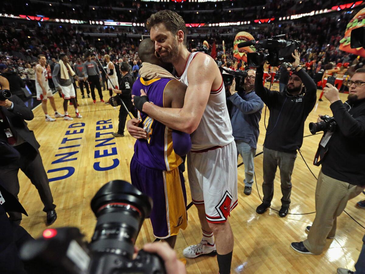 Bulls forward Pau Gasol hugs Lakers forward Kobe Bryant after a Feb. 21 game in Chicago.