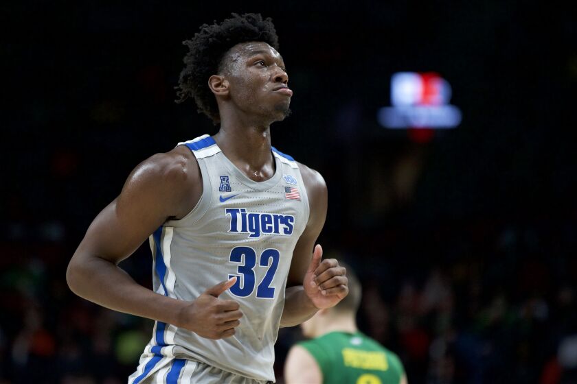 Memphis center James Wiseman runs off the court during the second half of an NCAA college basketball game against Oregon in Portland, Ore., Tuesday, Nov. 12, 2019. Oregon won 82-74. (AP Photo/Craig Mitchelldyer)