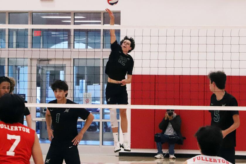 Sage Hill's Jackson Cryst (12) serves during Sage Hill High School boys' volleyball team against Fullerton High School boys' volleyball team in the CIF Southern Section Division 5 boys' volleyball playoffs at Fullerton High School in Fullerton on Thursday, April 25, 2024. (Photo by James Carbone)