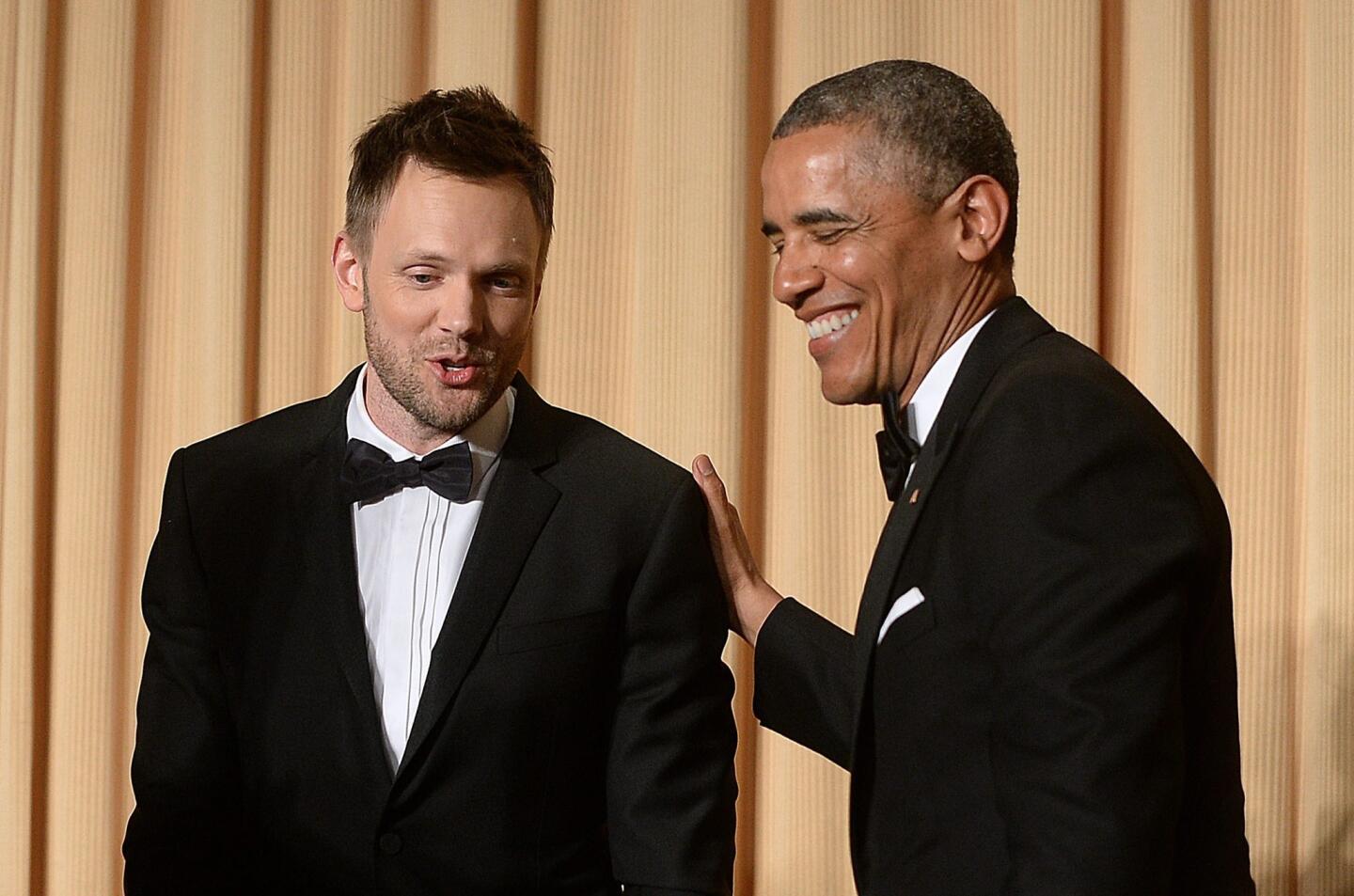 Comedian Joel McHale and President Obama have a laugh.
