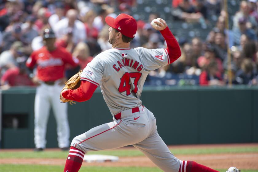 Los Angeles Angels starting pitcher Griffin Canning delivers against the Cleveland Guardians during the fourth inning of a baseball game in Cleveland Sunday, May 5, 2024. (AP Photo/Phil Long)