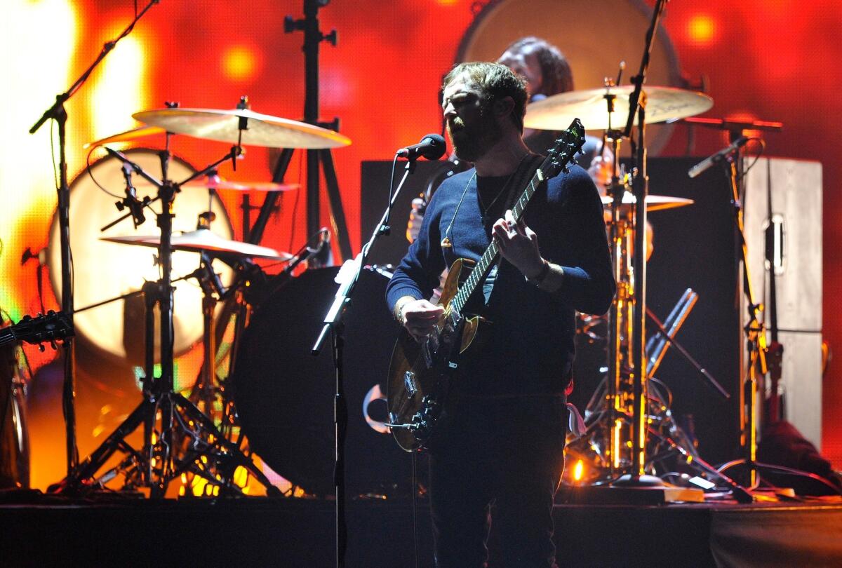 Caleb Followill of Kings of Leon, shown during the 2013 MTV EMA's in Amsterdam, Netherlands, are part of lineup at KROQ Annual Acoustic Christmas for which VIP tickets are being auctioned to benefit Red Cross Disaster Relief efforts in the Philippine.