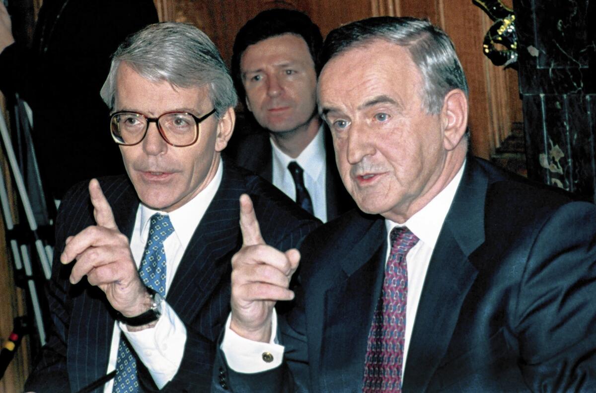 Irish Prime Minister Albert Reynolds, right, with British prime minister John Major after issuing the Downing Street Declaration, a 1993 blueprint for peace in Northern Ireland.