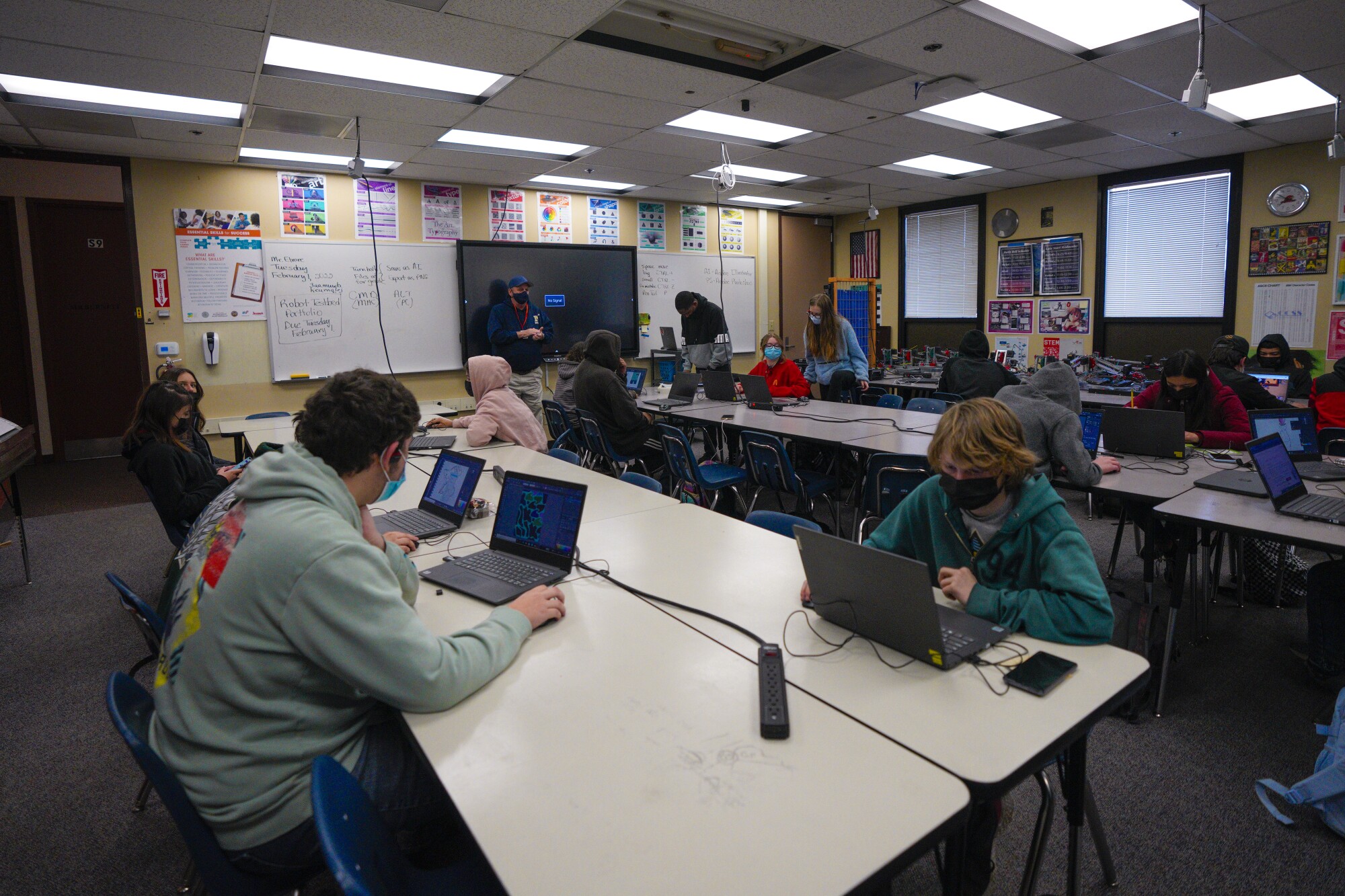 Students work on their graphic arts homework at Mountain Empire High School.