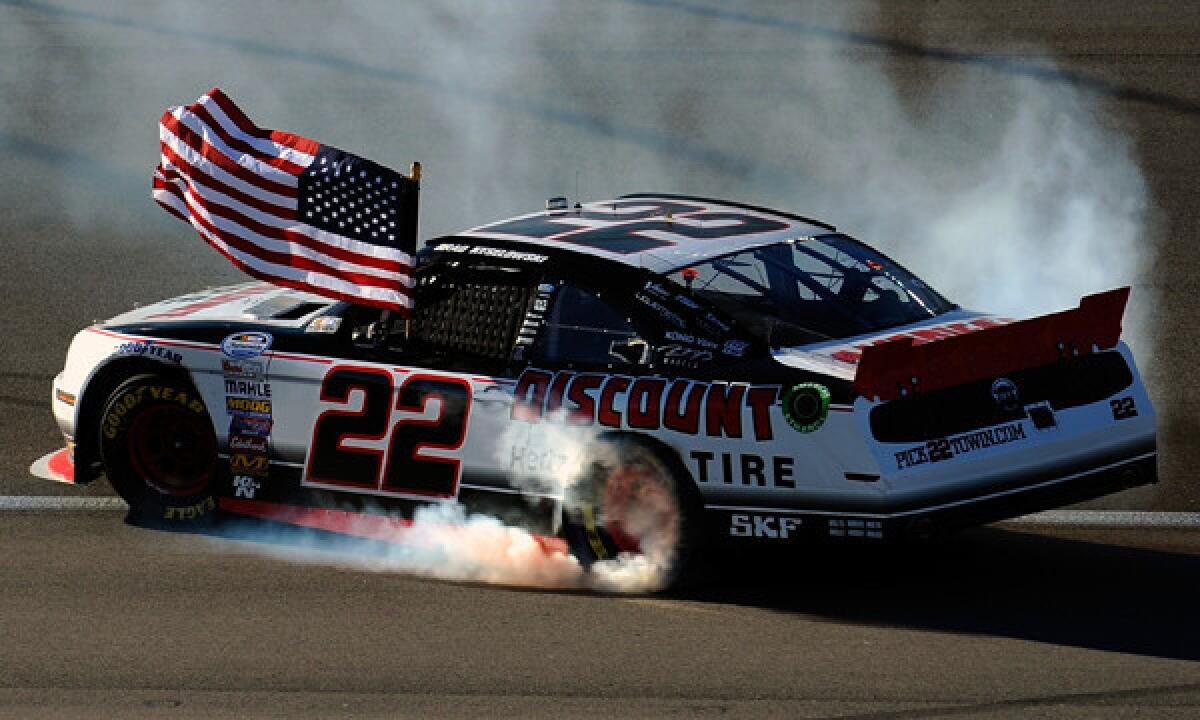 Brad Keselowski celebrates after winning Saturday's NASCAR Nationwide Series race at Las Vegas Motor Speedway.